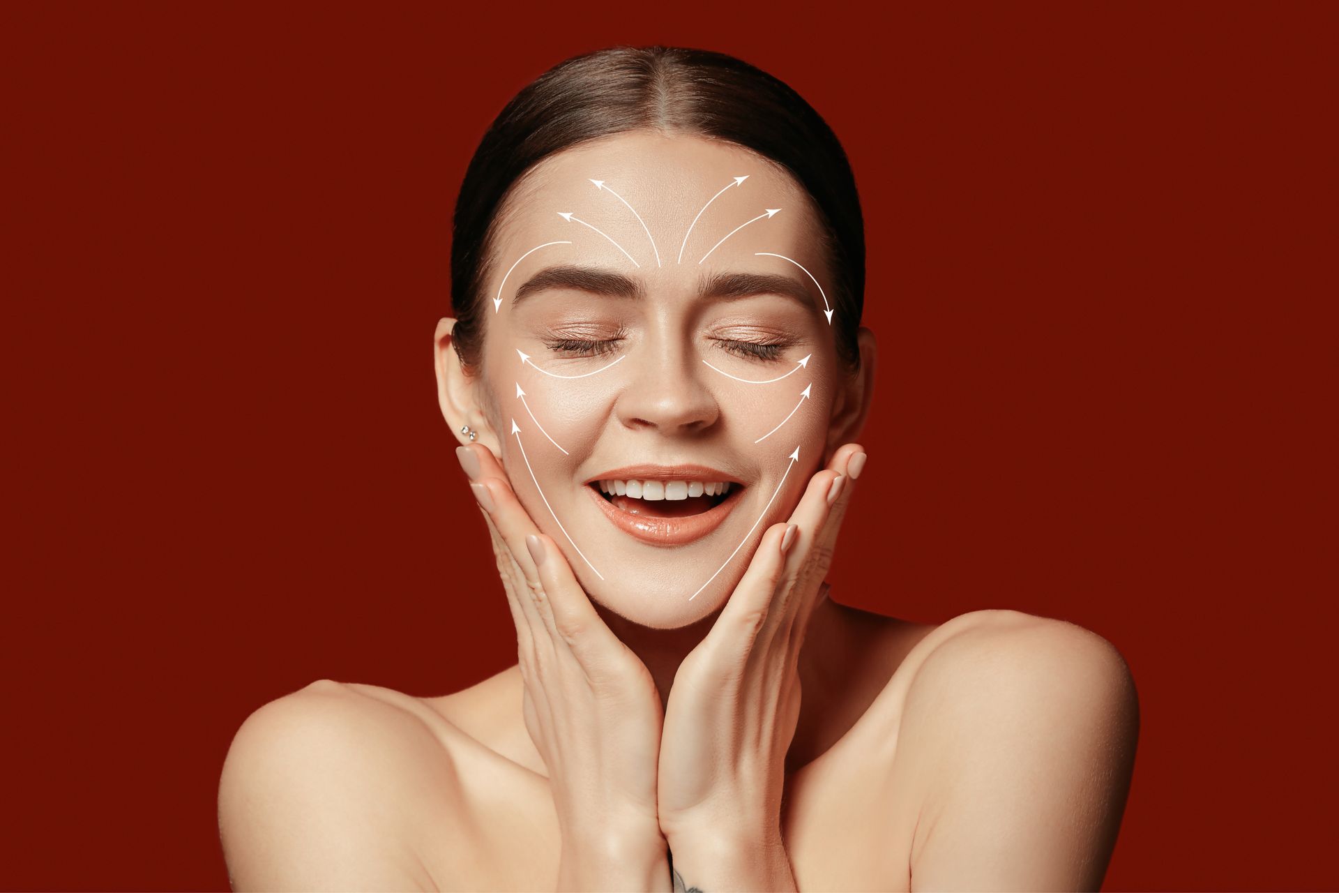 A woman is smiling with lines drawn on her face.