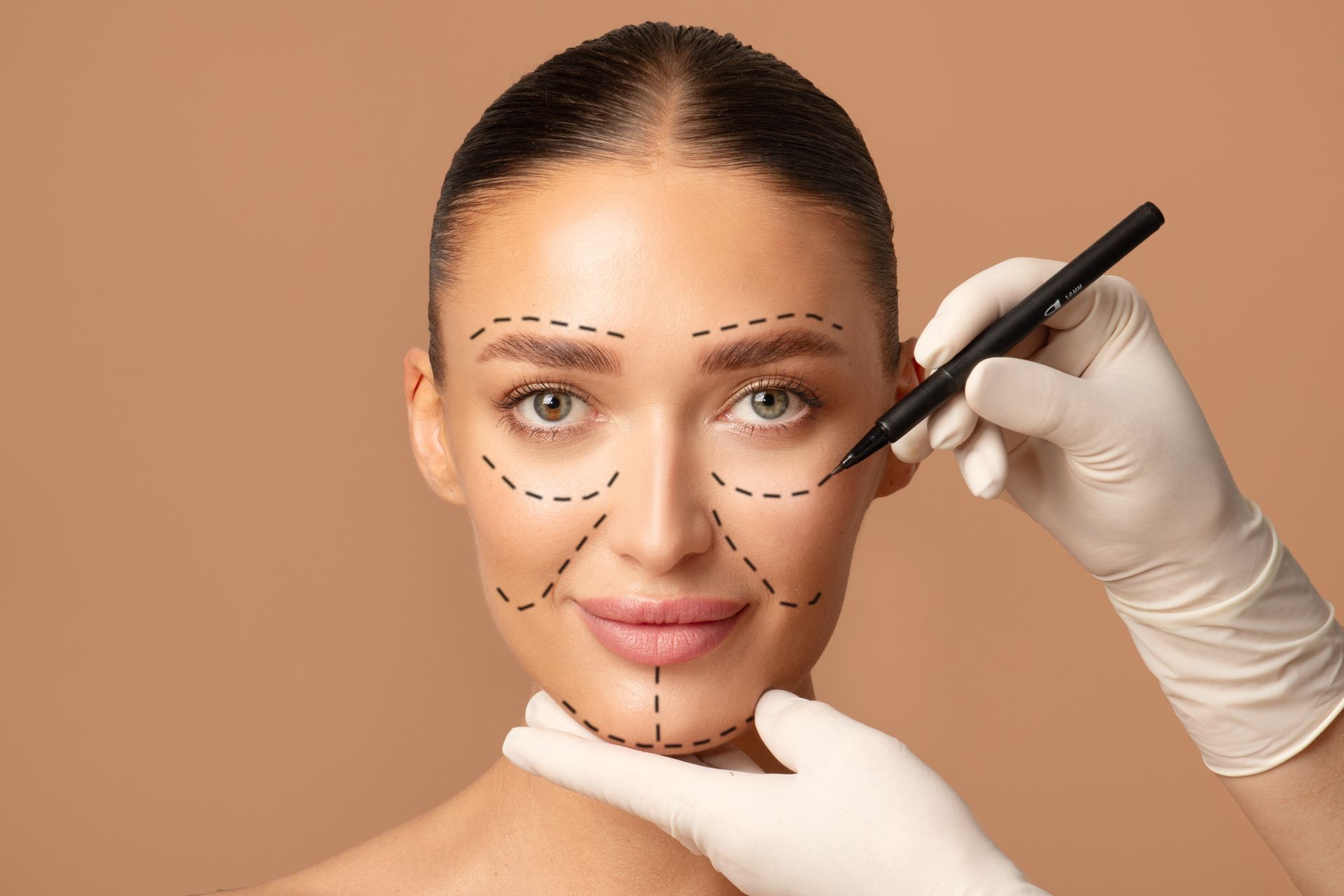 A woman is getting a cosmetic surgery on her face.