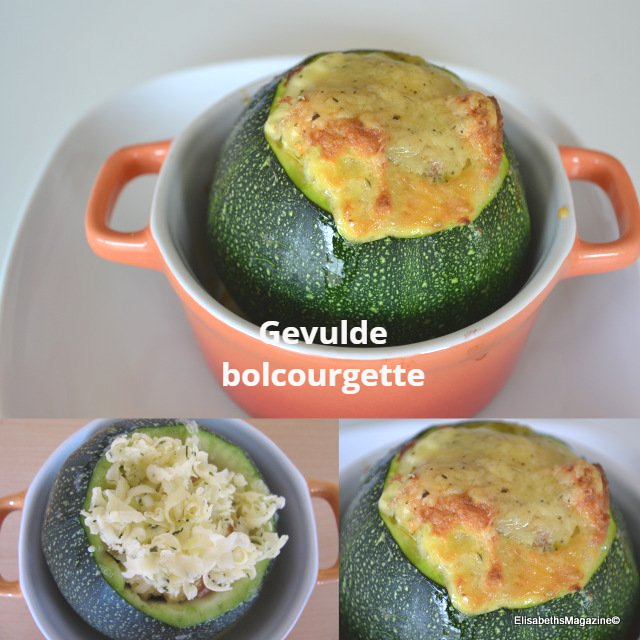 Gevulde ronde courgettes in een oranje kom, bedekt met kaas.
