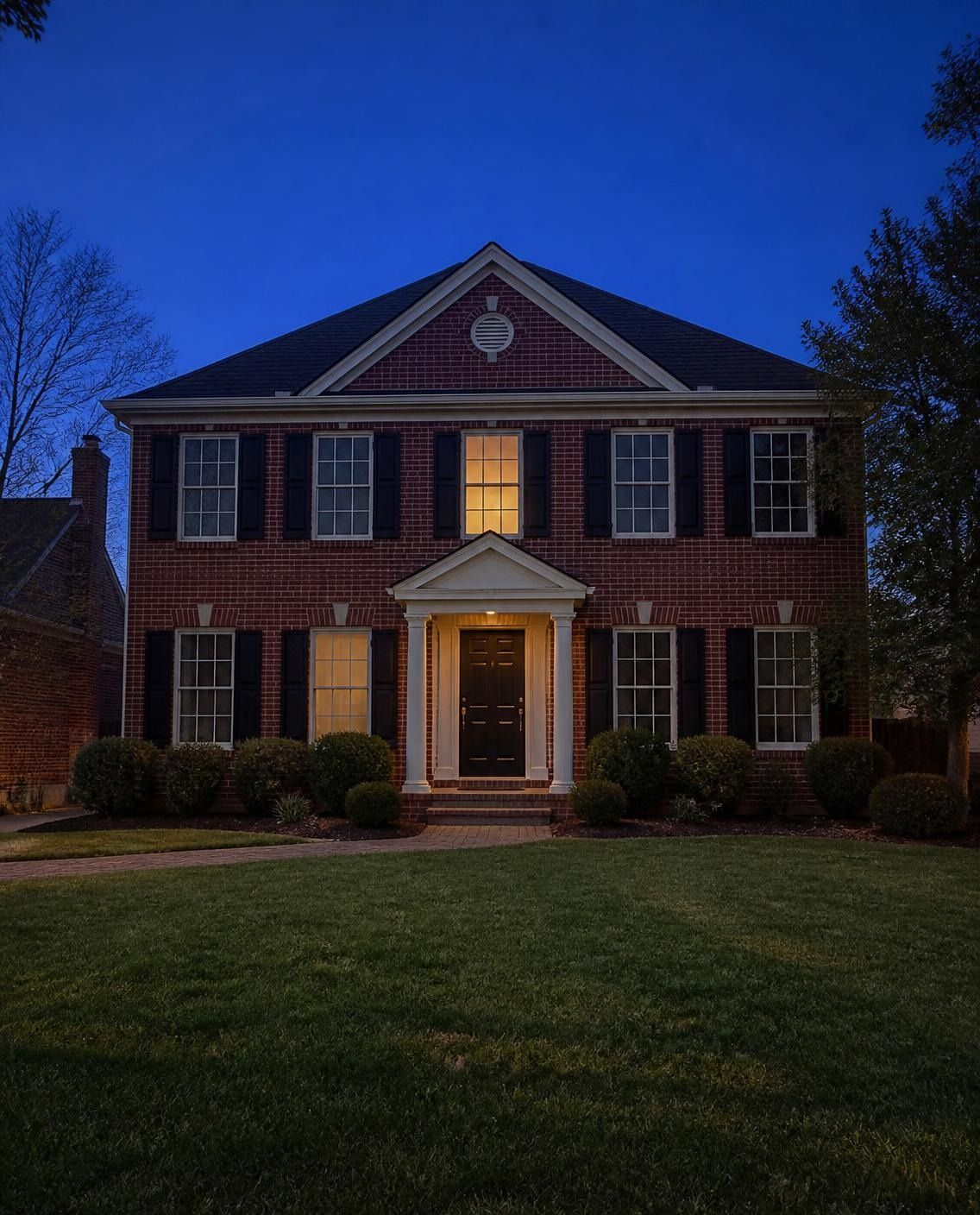 Home at dusk before holiday lighting
