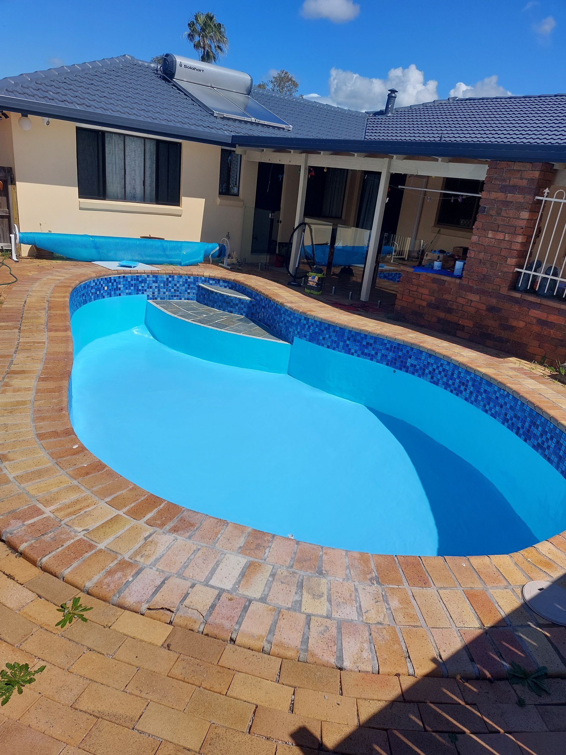 Long, Rectangular Swimming Pool Filled With Turquoise Water — Ballina Leak Detection & Swimming Pool Repairs in Ballina, NSW