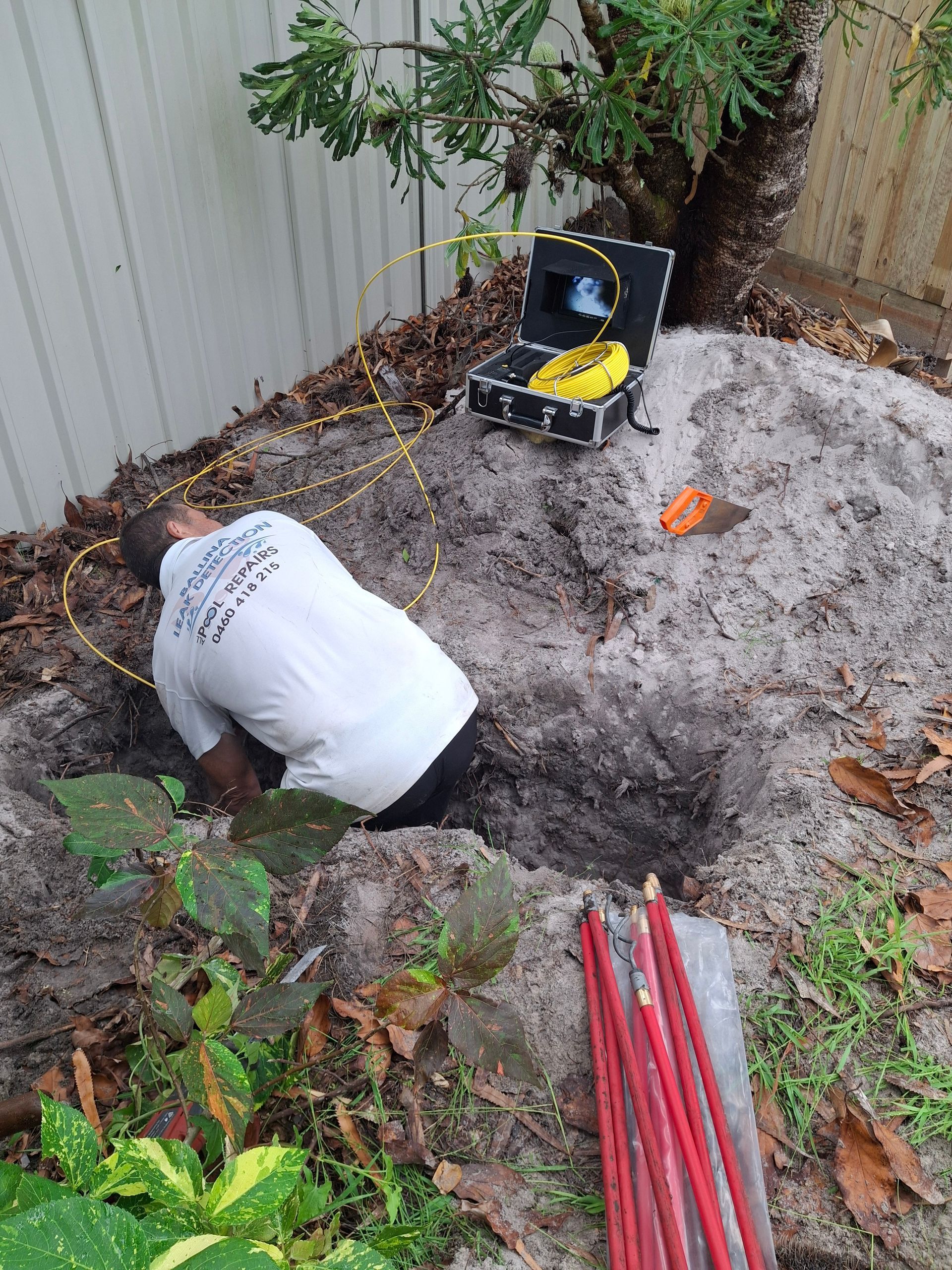 Poolside Pressure Gauge and Hose on Concrete — Ballina Leak Detection & Swimming Pool Repairs in Ballina, NSW