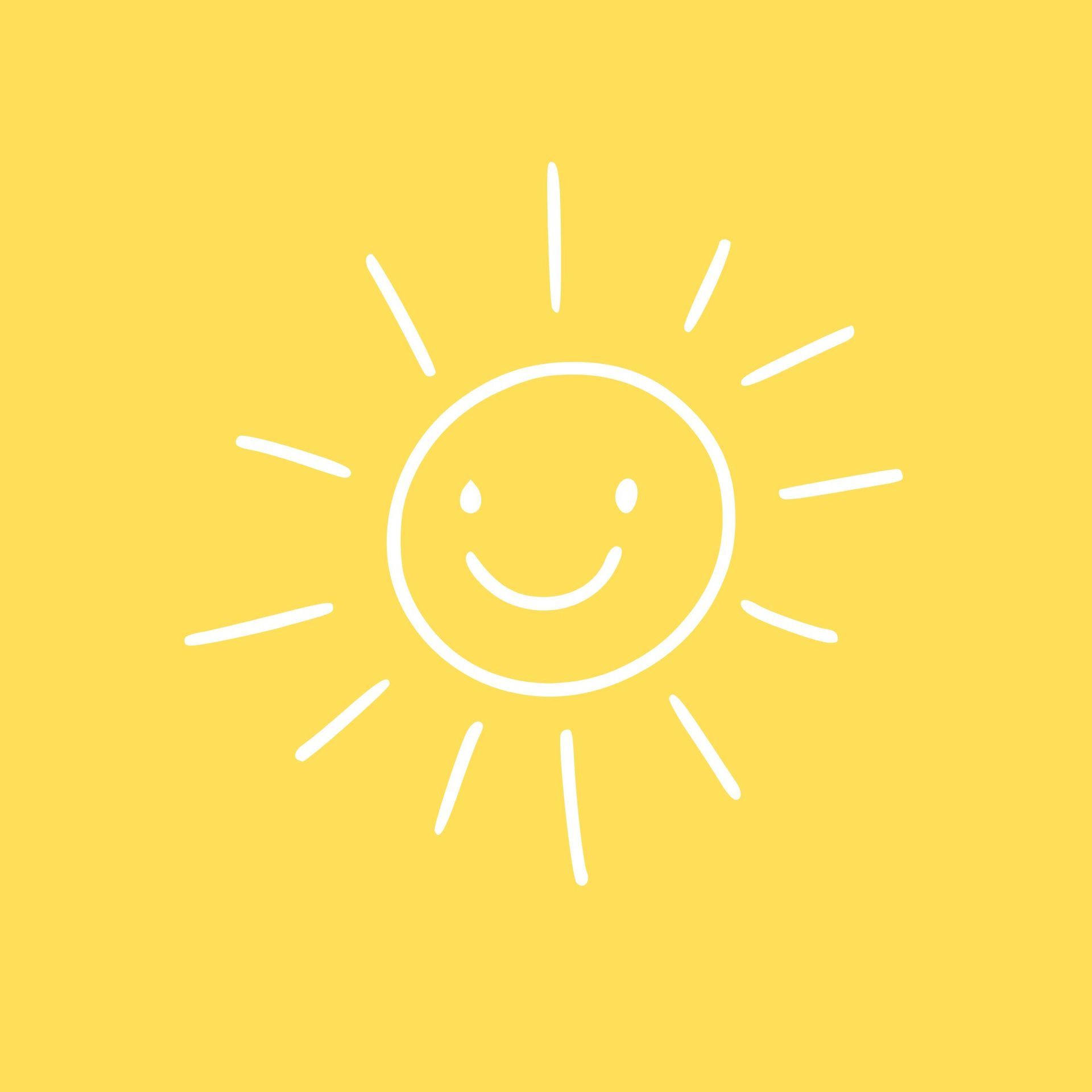 A drawing of a smiling sun on a yellow background.