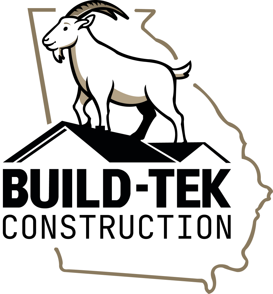 The logo for build-tek construction shows a goat standing on top of a roof.