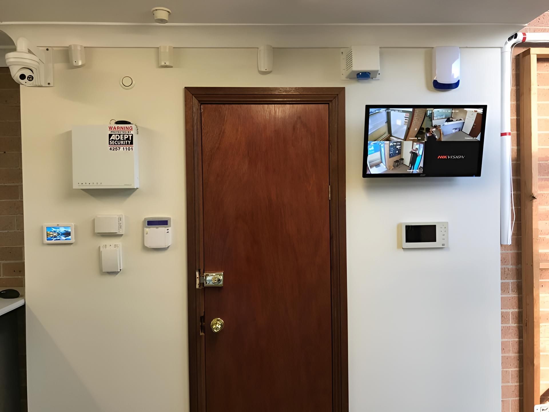 A Room With a Door and a Television on the Wall — Adept Security In Oak Flats, NSW
