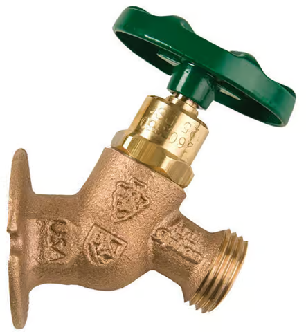 A brass faucet with a green handle made in the usa