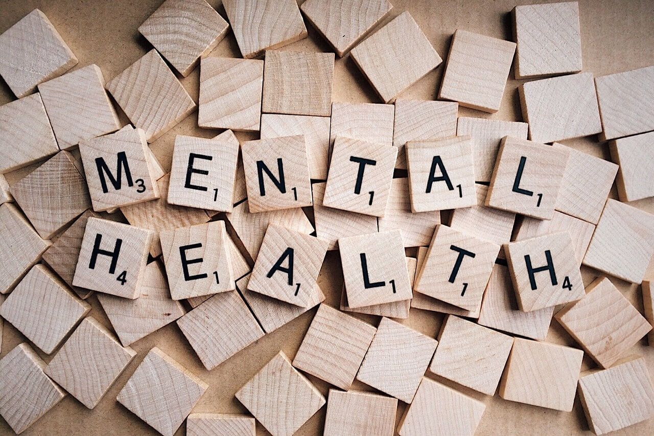 wooden blocks spelling mental health