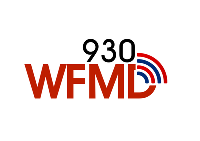 WFMD 930 logo in red and black with blue radio signal waves