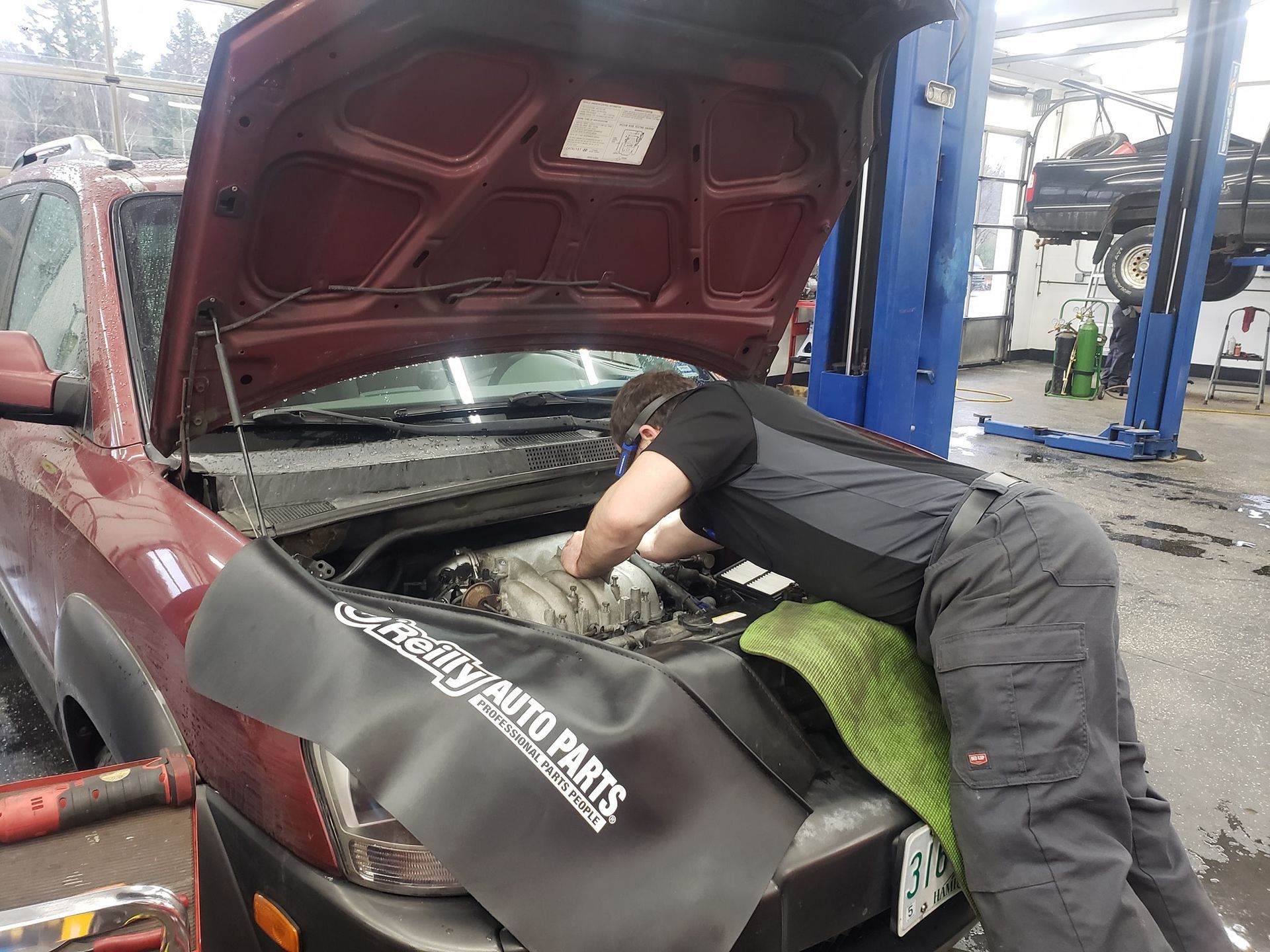 Team Member Doing Repair | J.S. Automotive