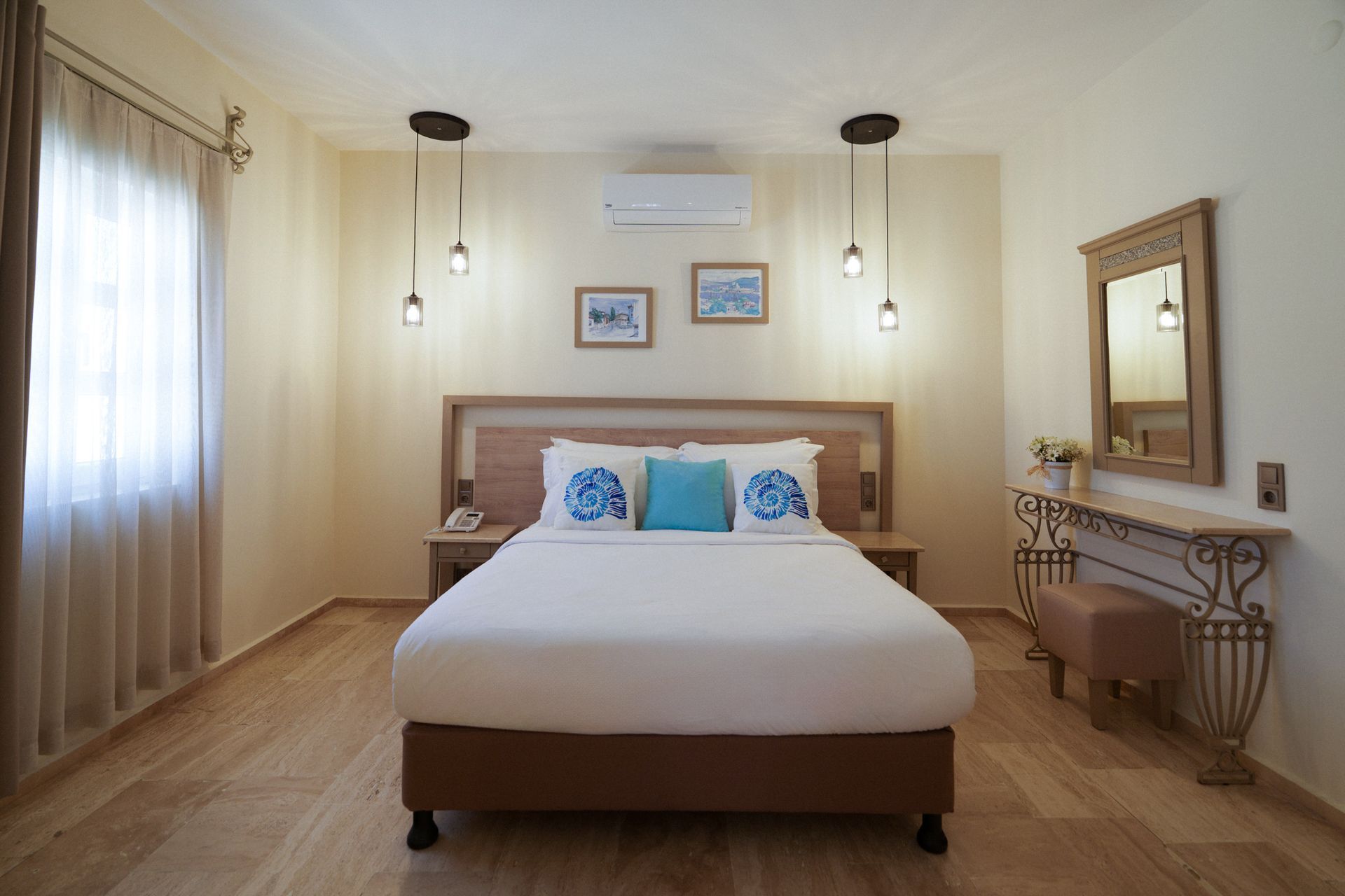 Manzara Boutique Hotel | Deluxe Room Bright bedroom with a centered bed, white bedding, wooden furniture