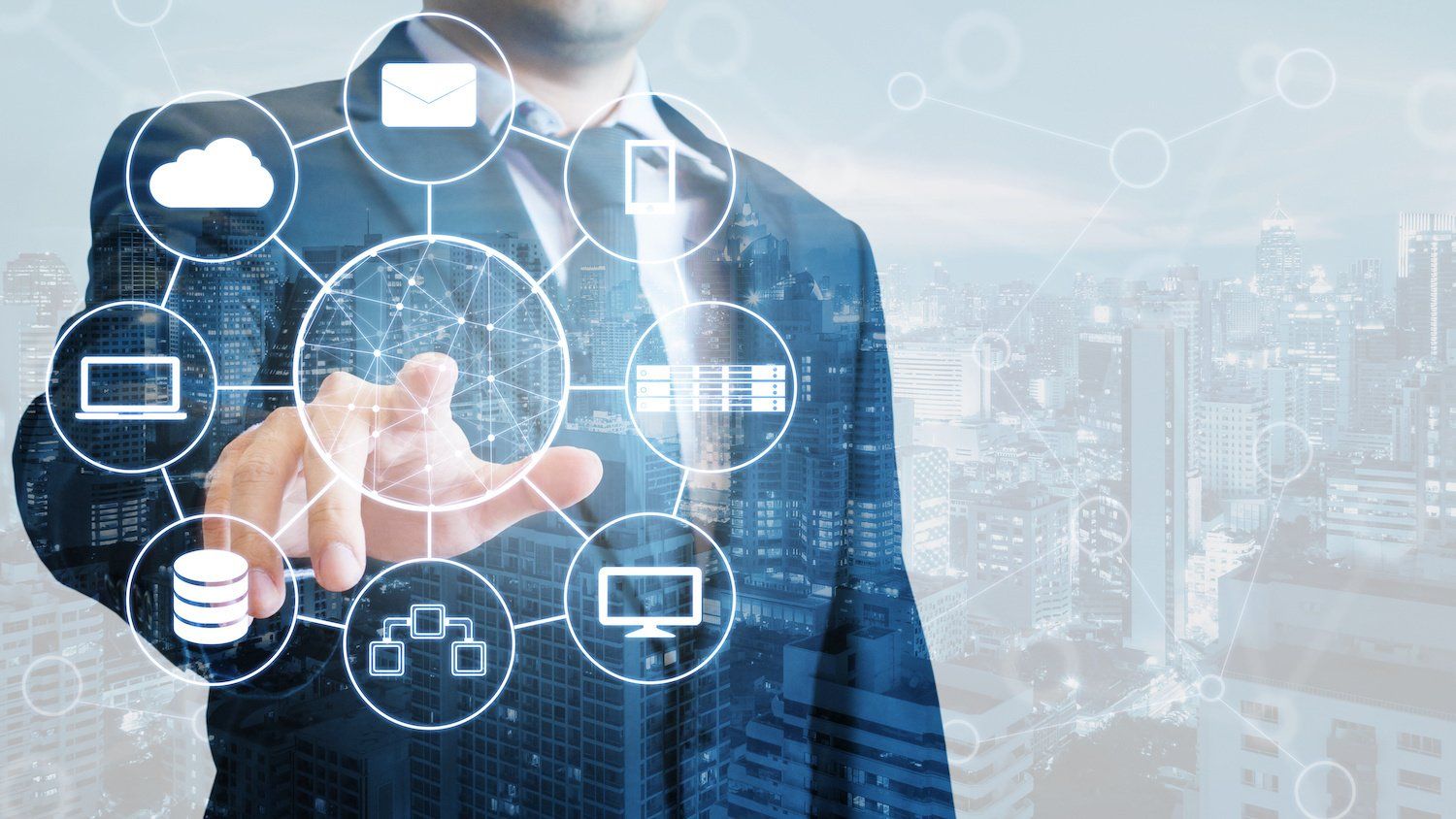 A business man surrounded by graphics and icons related to business