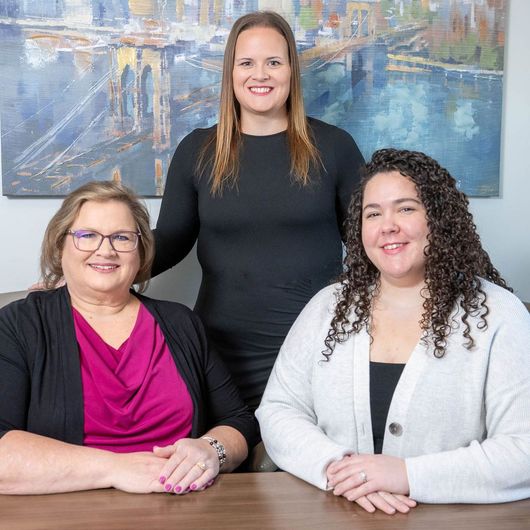 image of three women leadership team at Ultimate Realty. Sue Gerling, Lisa Miller, Maddie Colegrove