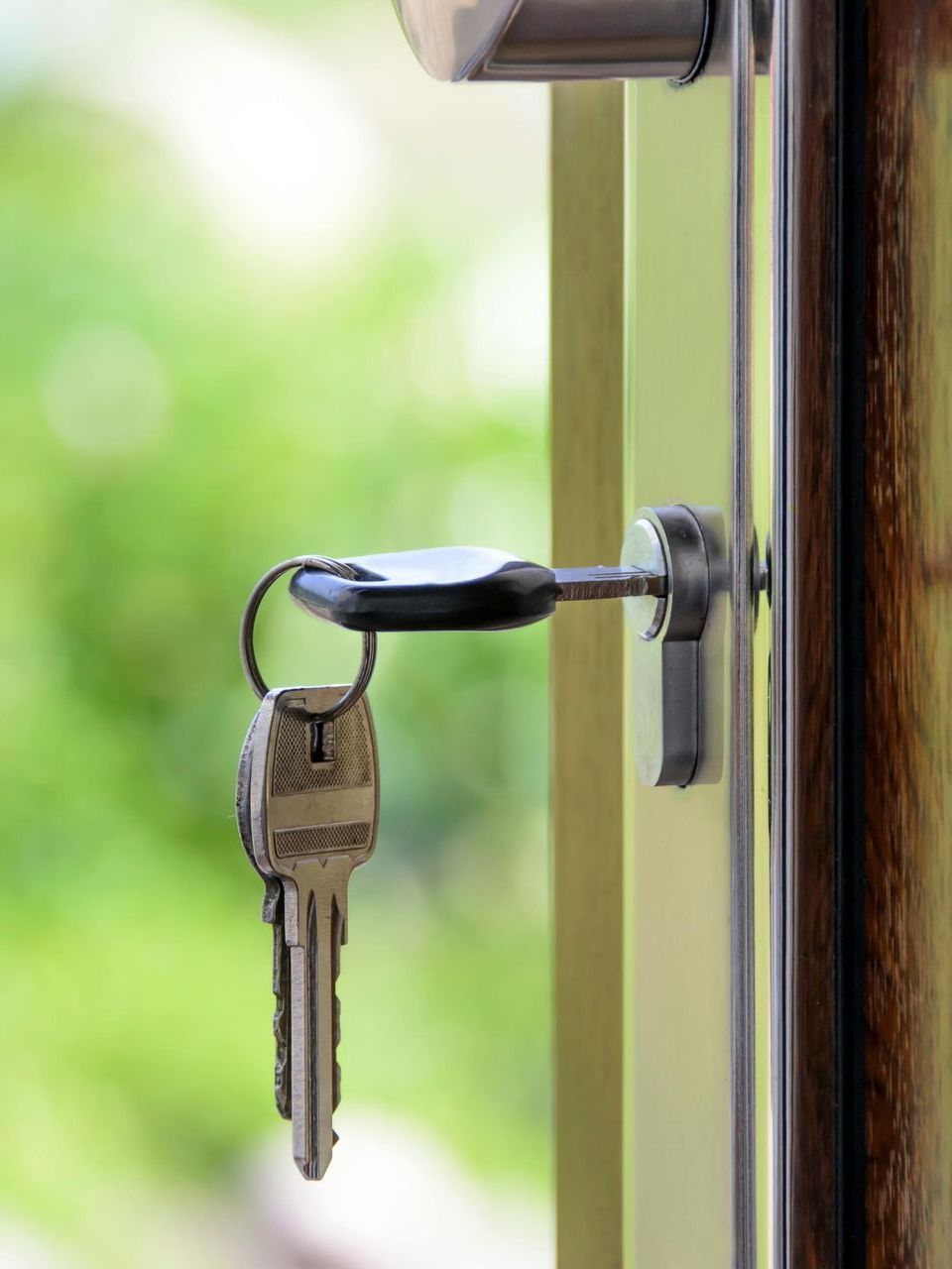 image of a key in a front door