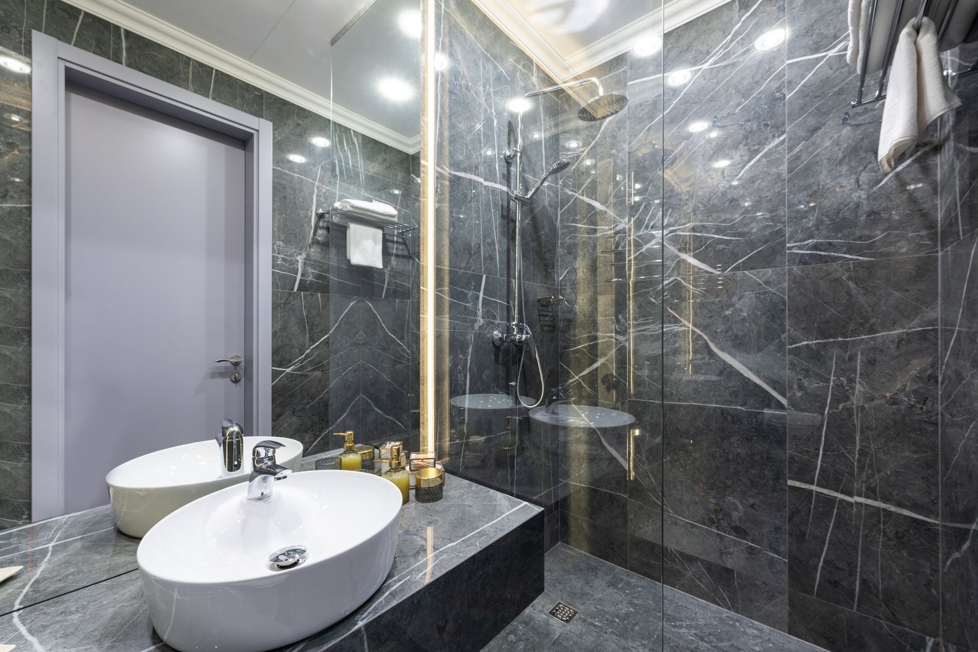 Save The Water Concept.hand Closing Valve On Sink In Bathroom — Xtreme Seals Leaking Shower Specialists in West Wollongong, NSW