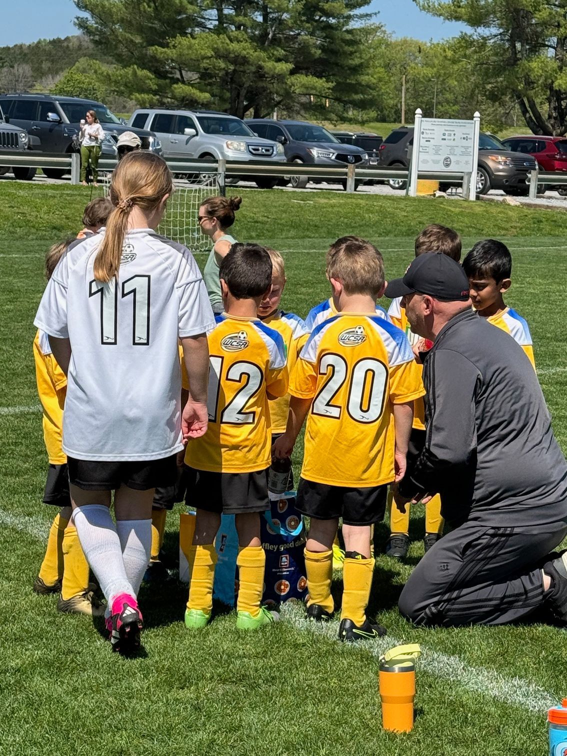 Williamson County Soccer Association team huddled on the field