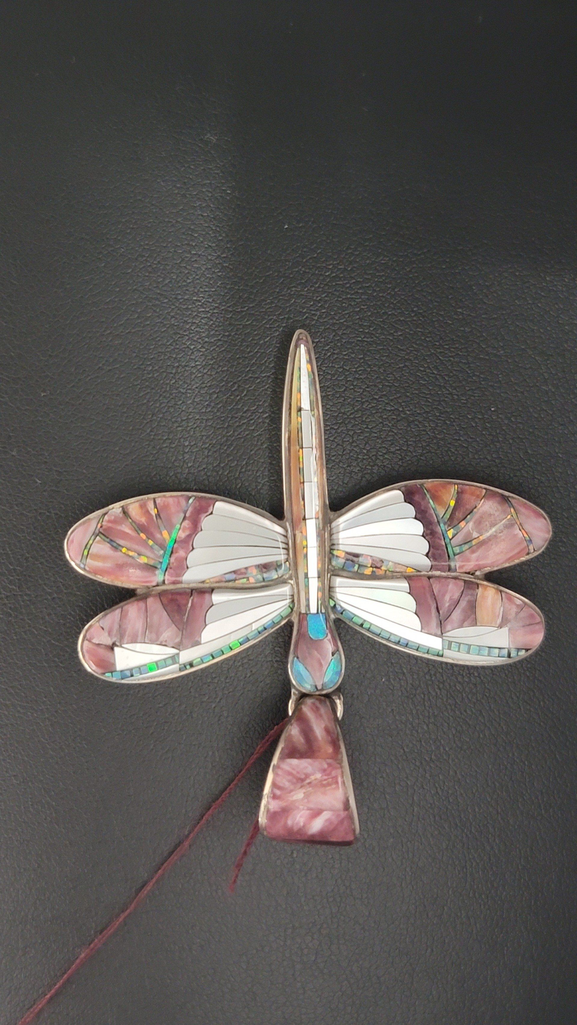 Dragonfly pendant, silver and inlaid stone mosaic wings, reddish-purple, turquoise, white.