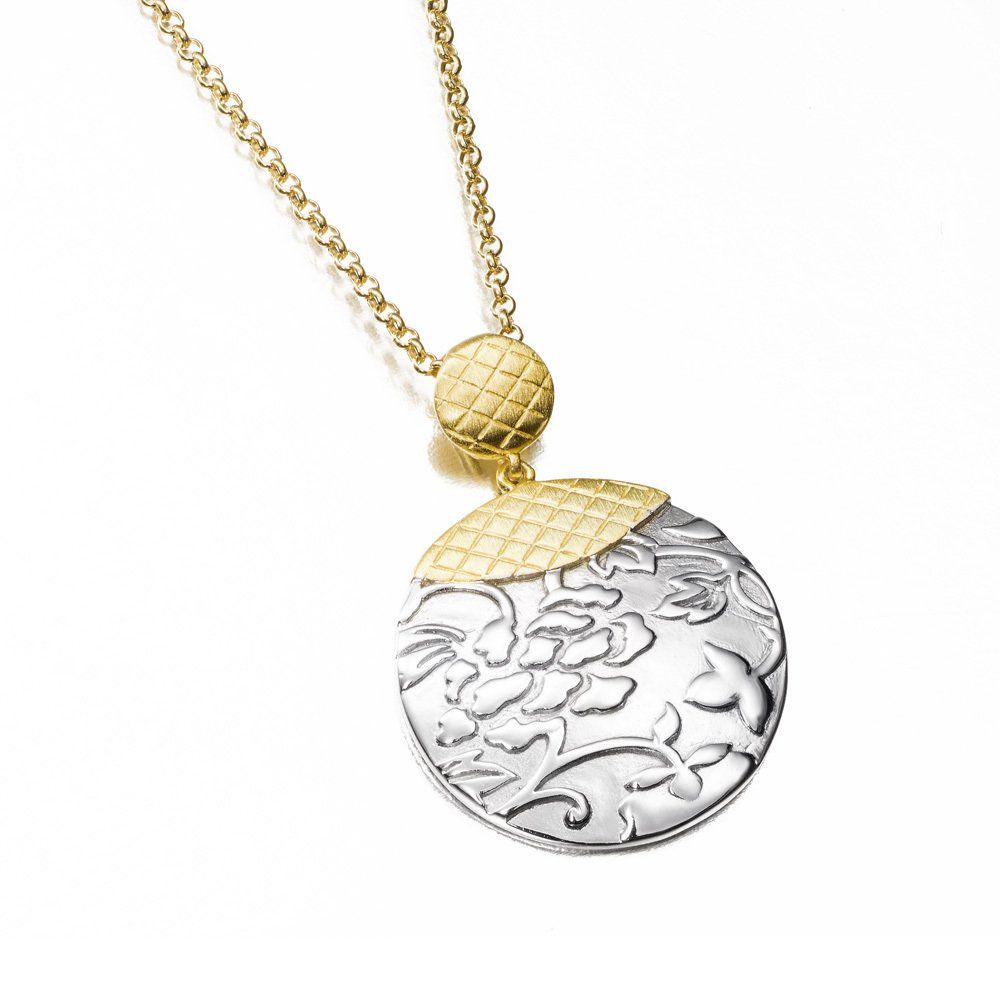Gold and silver floral pendant necklace.