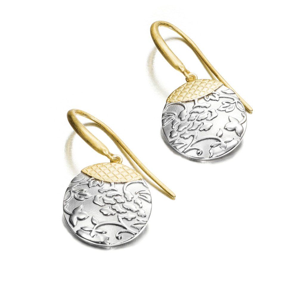 Gold and silver drop earrings with floral design.