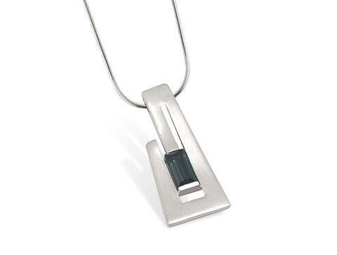 Silver pendant necklace with a rectangular blue gemstone.