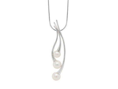 Silver necklace with three white pearls.