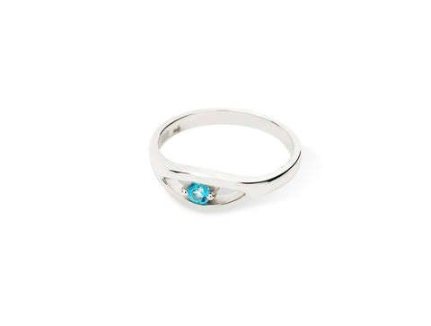 Silver ring with a blue gemstone set in a curved band.