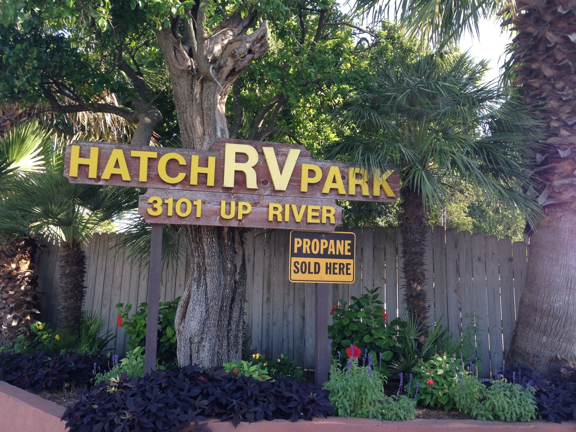 A sign for hatch rv park 3101 up river