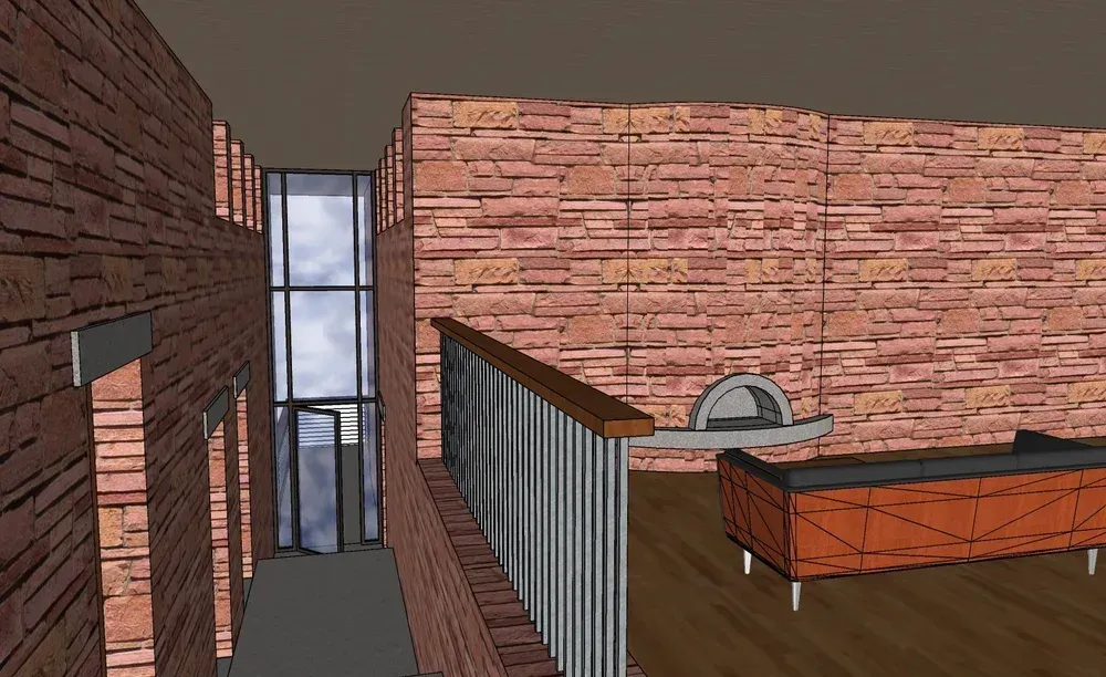 Brick-walled room with a desk and shelving beside a tall window overlooking a narrow alley