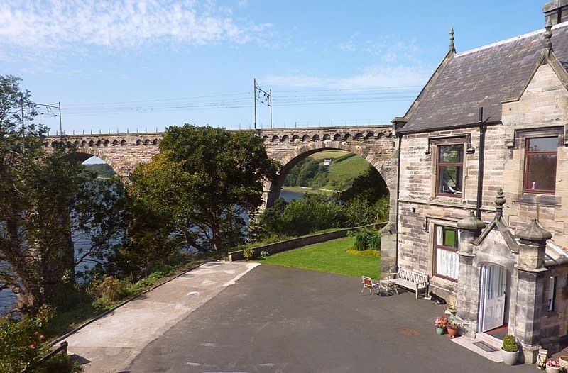 Front of house and railway bridge 