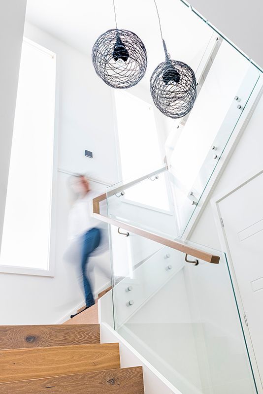 A blurry picture of a person walking up a set of stairs.