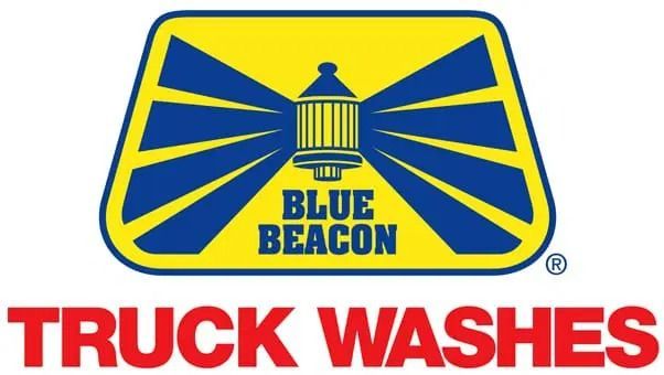 Blue Beacon Truck Washes logo featuring a yellow-and-blue beacon icon with the words 