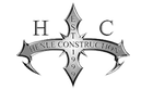 Henle Construction logo with a gray cross and the letters H, C, and EST 1992
