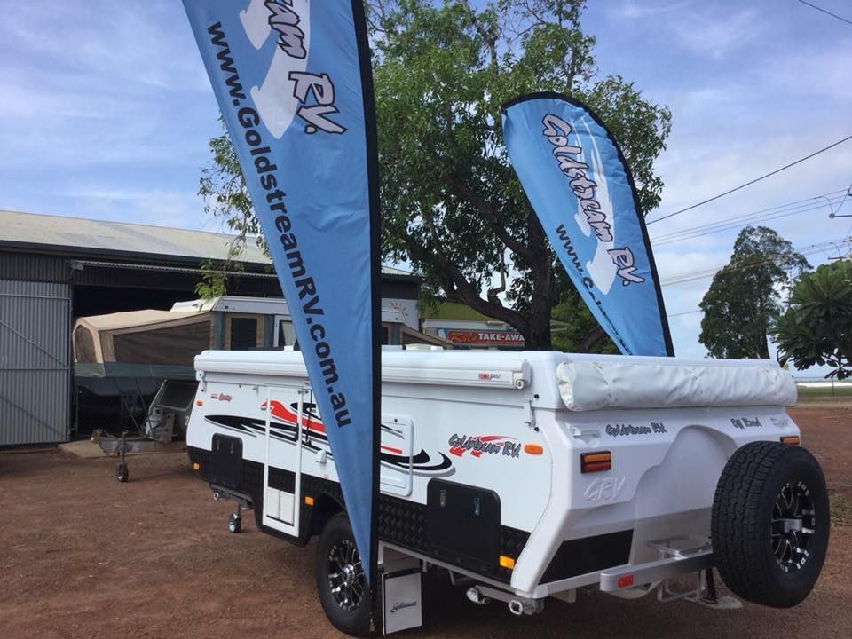 A White Trailer With a Blue Banner — Darwin Caravan & RV Centre In Berrimah, NT