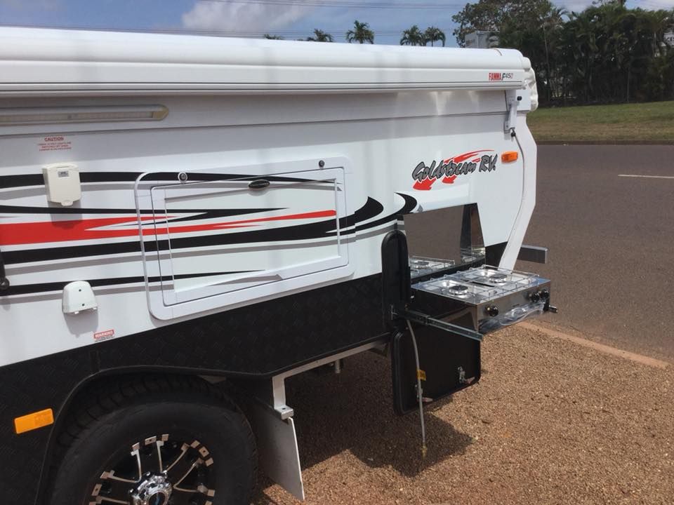 A White and Black Trailer is Parked on the Side of the Road — Darwin Caravan & RV Centre In Berrimah, NT