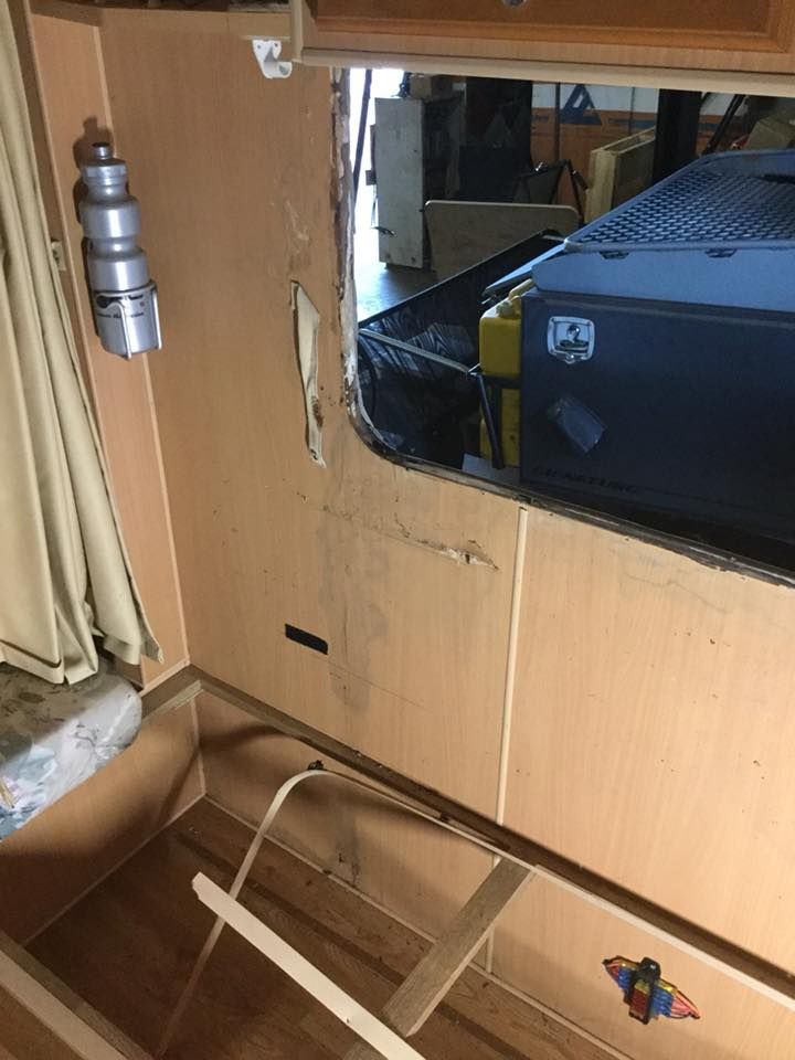 A Computer is Sitting on a Table in a Room Next to a Window — Darwin Caravan & RV Centre In Berrimah, NT