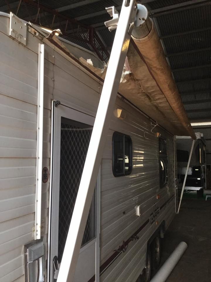 A White RV With a Ladder Attached to It — Darwin Caravan & RV Centre In Berrimah, NT
