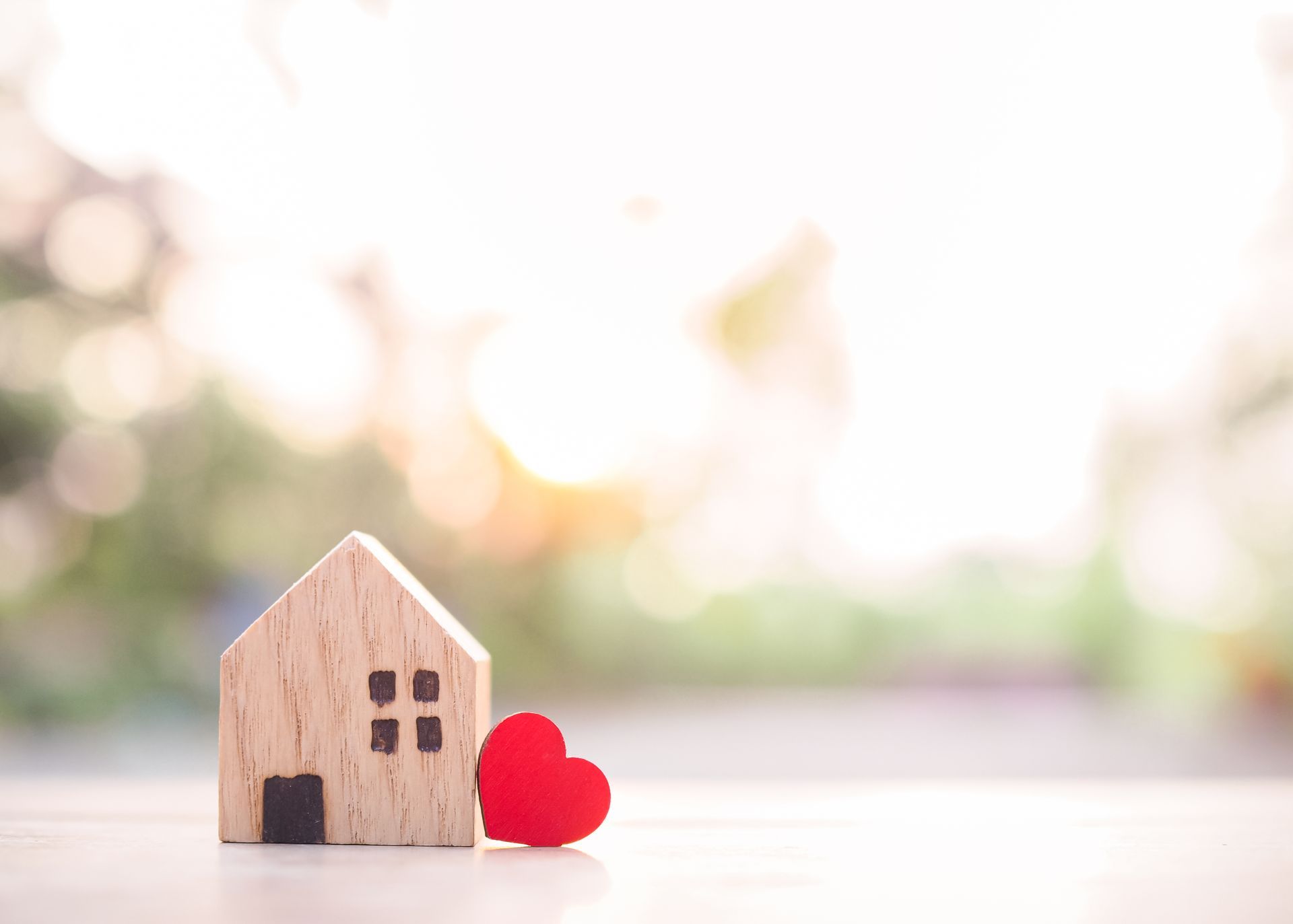 Fake house outside with a red heart.