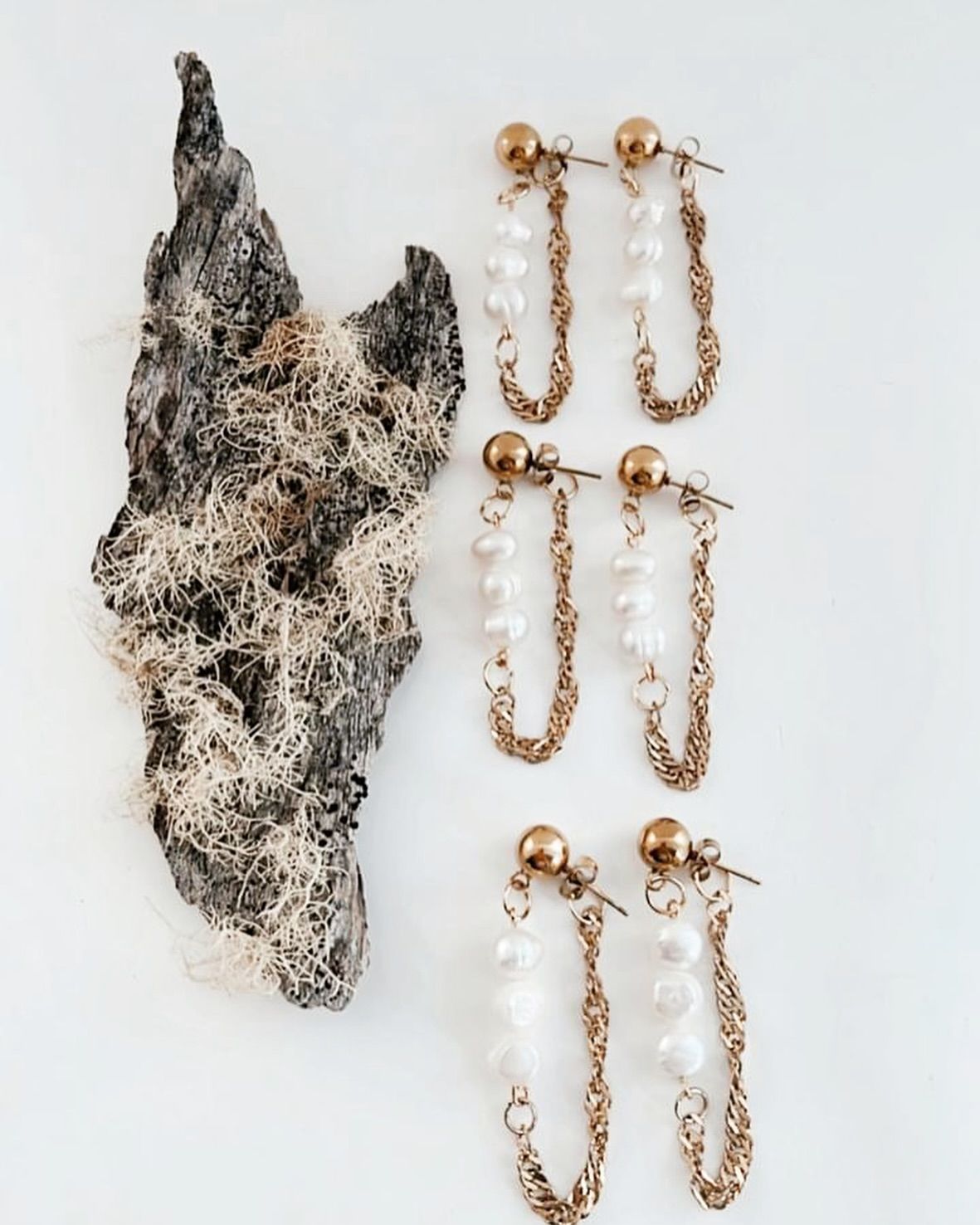 Gold Earrings With White Pearls and Chains Displayed — Decadence Gifts & Homewares in Central Highlands, QLD