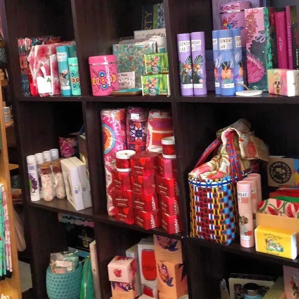 Shelves Stocked With Colourful Merchandise in a Shop — Decadence Gifts & Homewares in Springsure, QLD