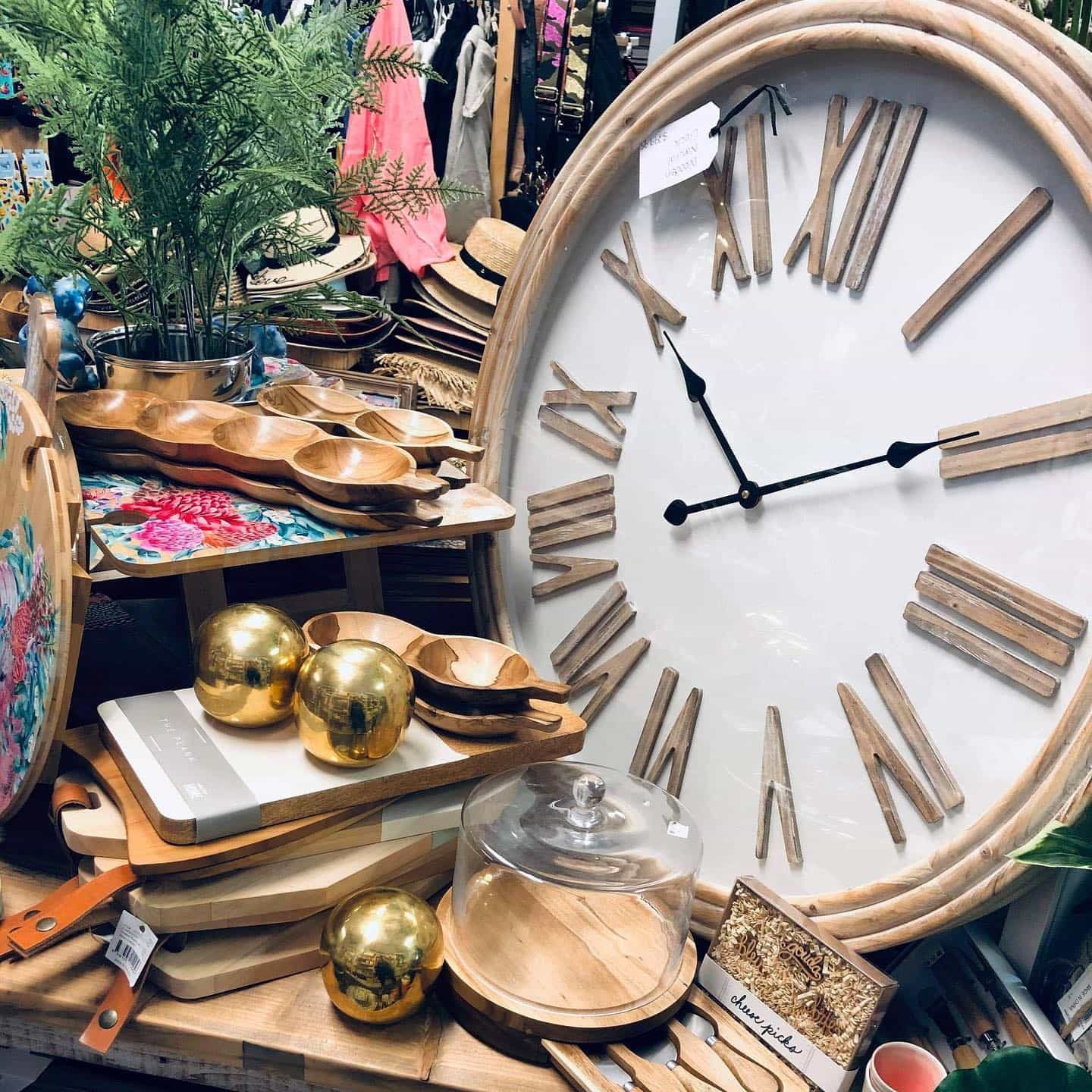 A Large Clock, Serving Bowls, and Decorative Items Displayed in a Store — Decadence Gifts & Homewares in Springsure, QLD