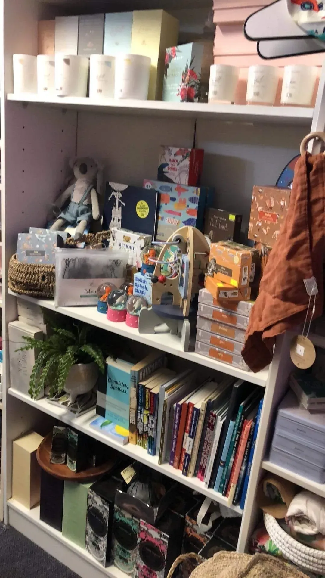 Shelves in a Store Filled With Gift Boxes — Decadence Gifts & Homewares in Springsure, QLD