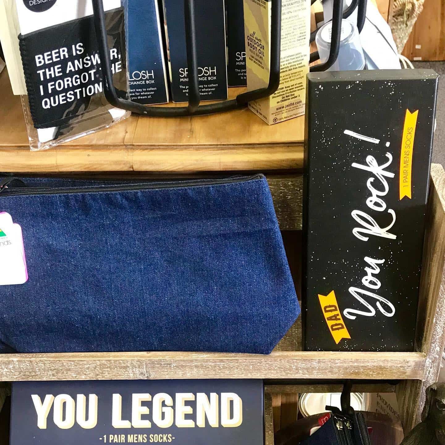 Denim Pouch Next to a Black Sign — Decadence Gifts & Homewares in Springsure, QLD