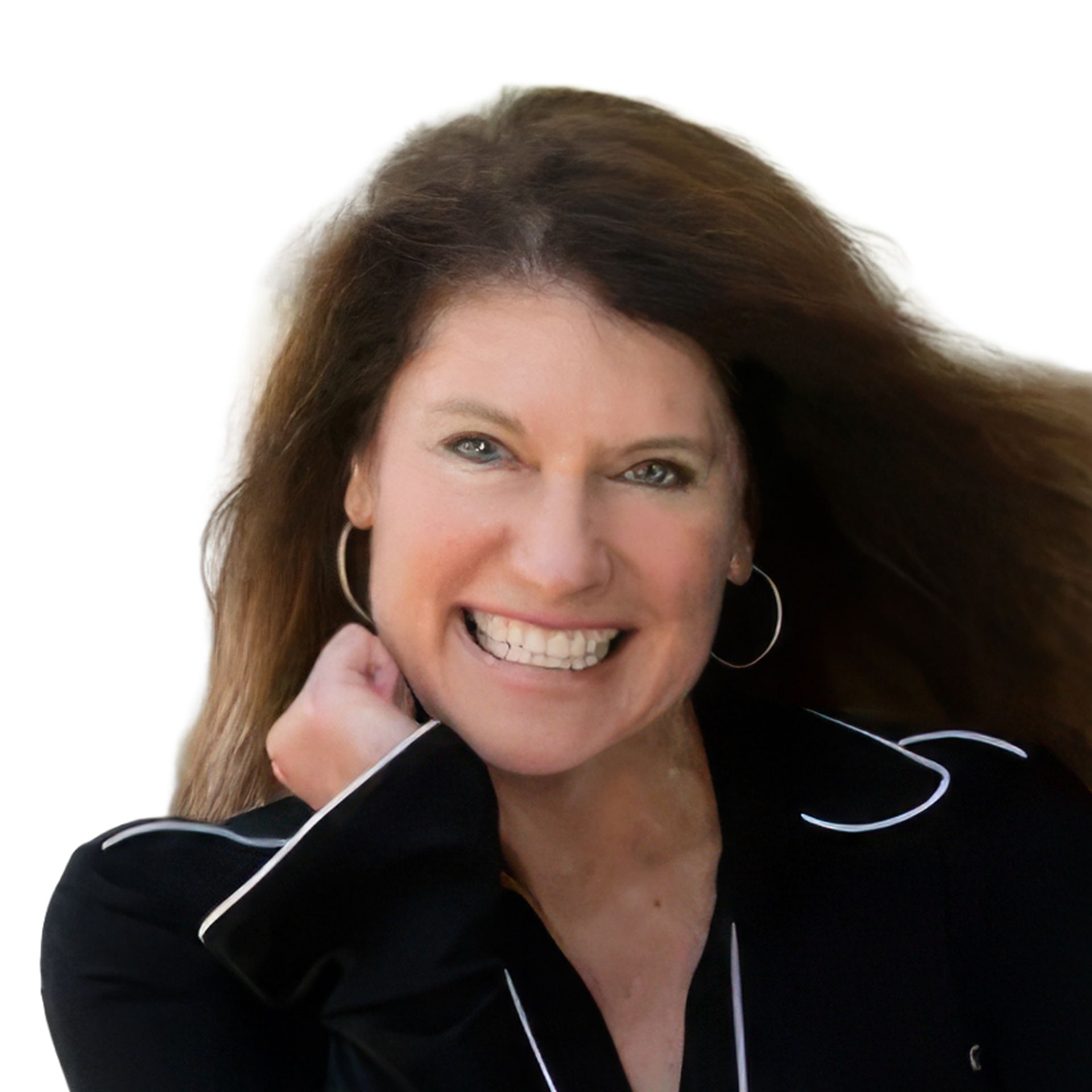 Smiling woman with long brown hair in a black top, hand near her chin, on a white background