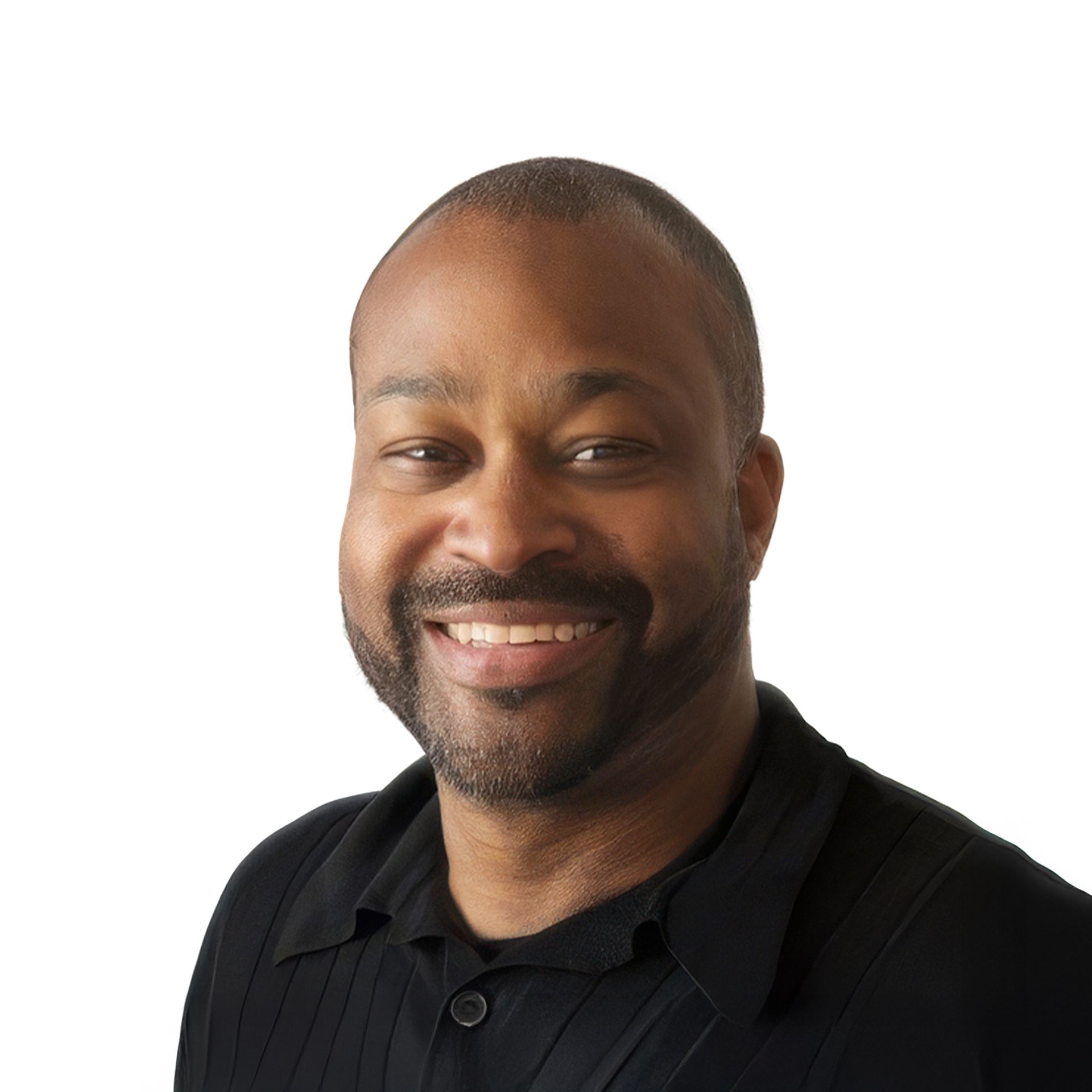 Smiling man in a black polo shirt against a white background