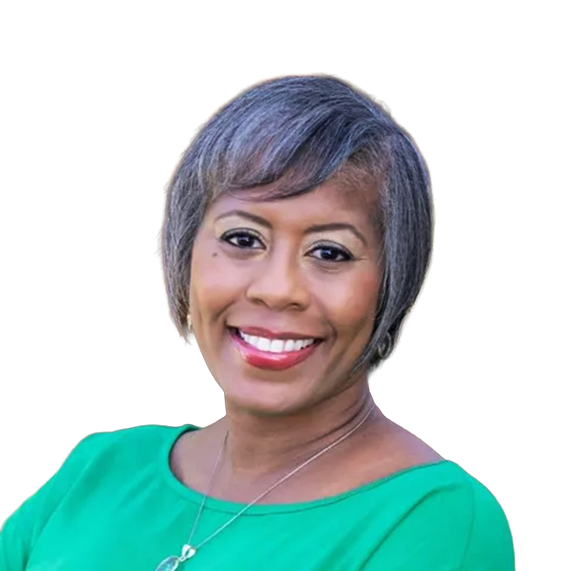 Smiling woman with short gray hair in a green top on a white background