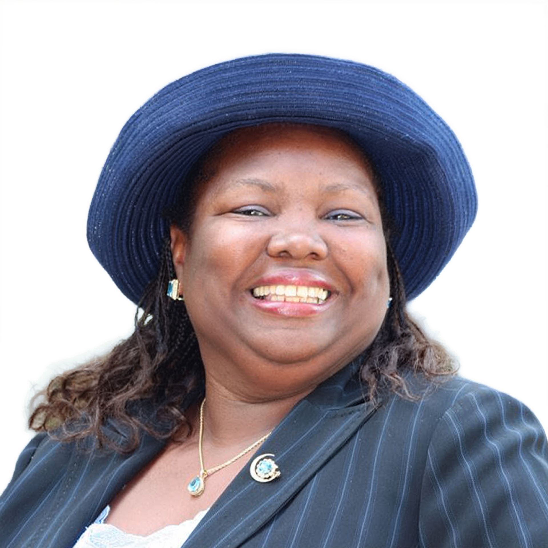 Smiling woman in a wide-brimmed blue hat and dark striped blazer against a white background