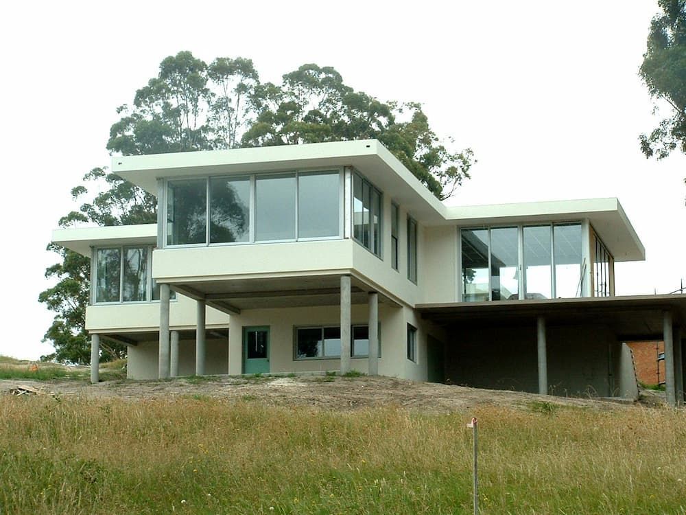A Large White House With A Lot Of Windows — South Coast Glass In South Nowra, NSW