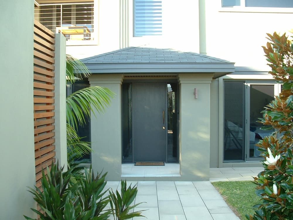 The Front Door Of A House With The Number 4 On It — South Coast Glass In South Nowra, NSW