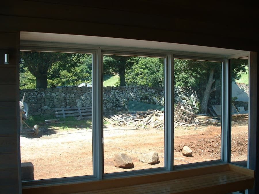 A Large Window With A View Of A Field And Trees — South Coast Glass In South Nowra, NSW