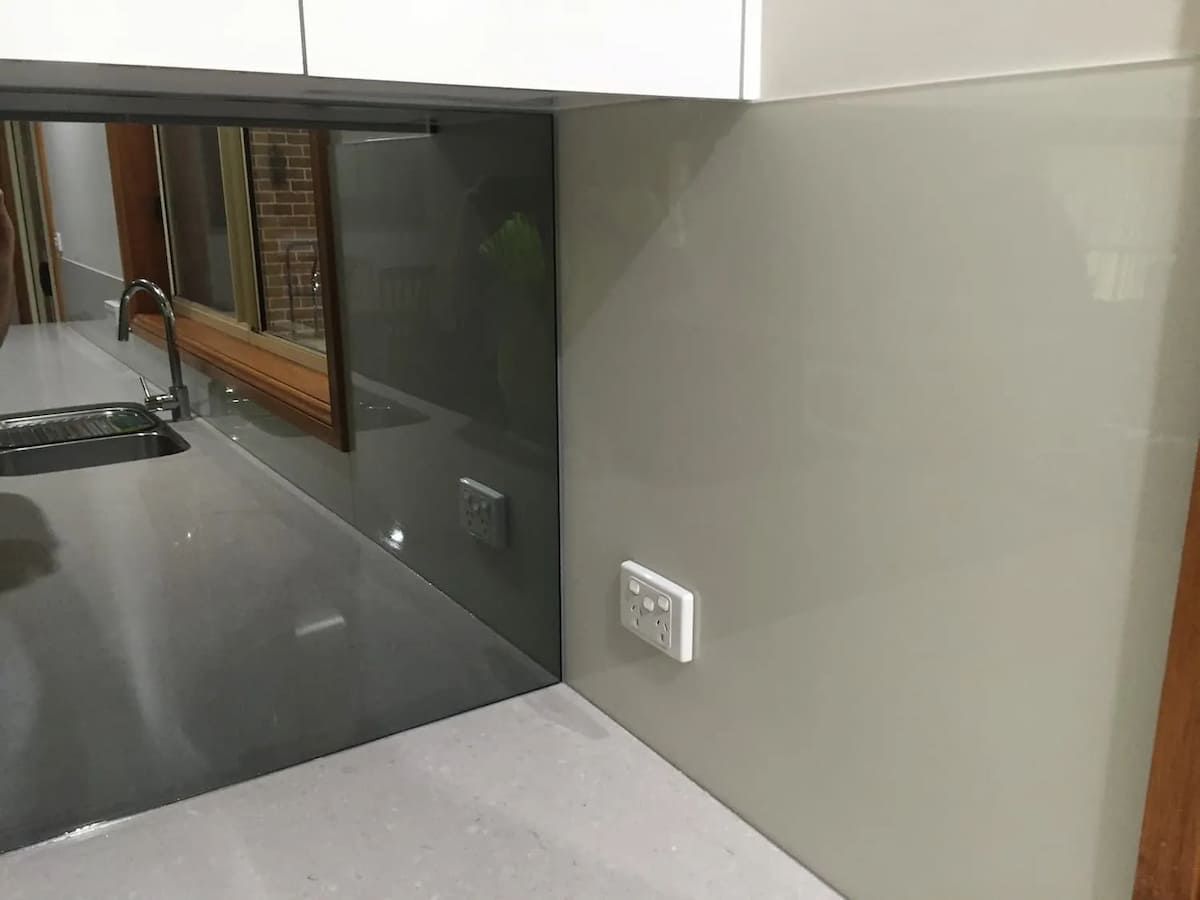 A Kitchen With A Sink And A Mirror On The Wall — South Coast Glass In South Nowra, NSW