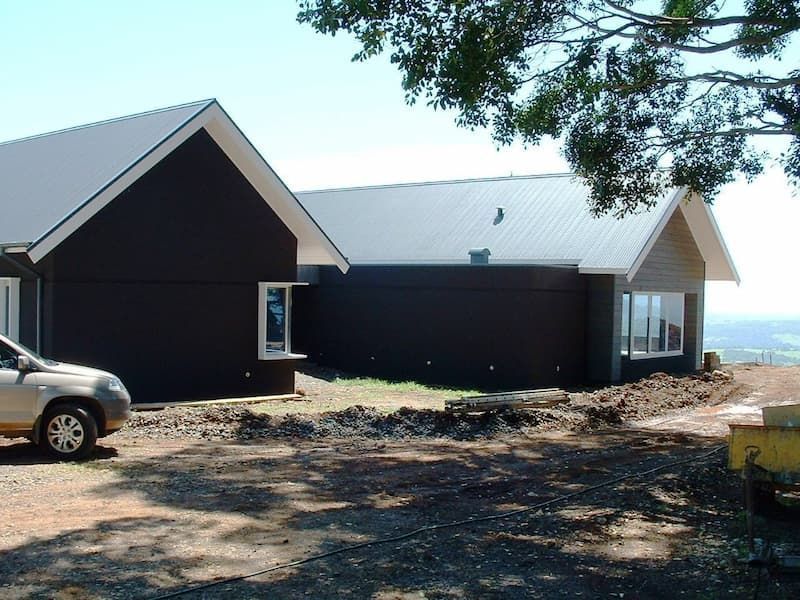 A Car Is Parked In Front Of A House That Is Under Construction — South Coast Glass In South Nowra, NSW